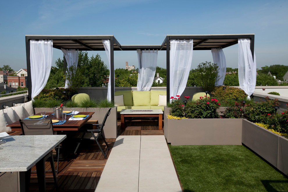 Design ideas for a contemporary patio in Chicago with decking and a gazebo/cabana.