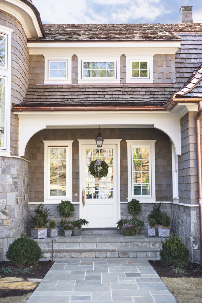 Design ideas for a large traditional front door in Other with a single front door and a glass front door.