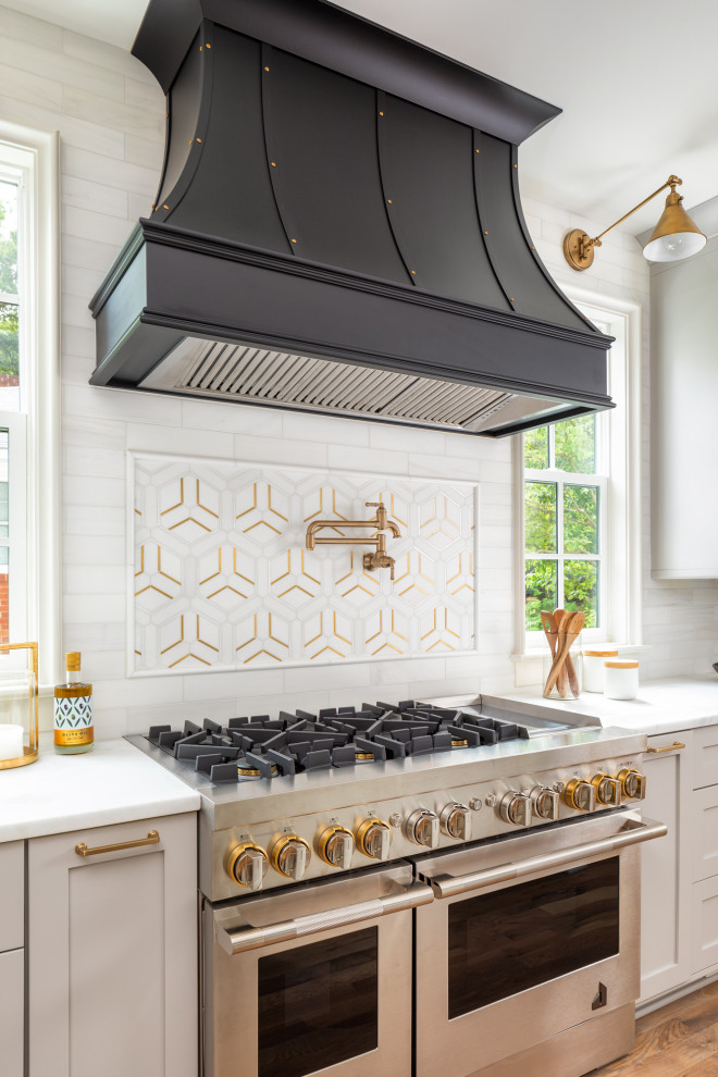 Example of a transitional kitchen design in Charlotte