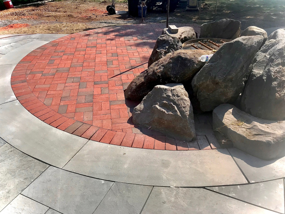 Custom Boulder Firepit and Patio