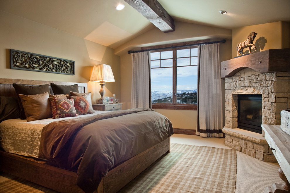 Inspiration for a traditional bedroom in Salt Lake City with a corner fireplace and a stone fireplace surround.