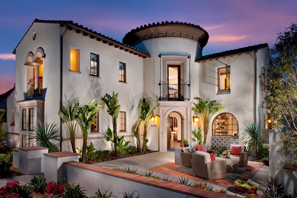 Large two-storey stucco beige exterior in San Diego.
