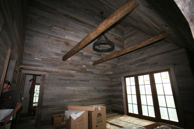 Reclaimed oak barnwood for interior wall paneling rustic-bedroom