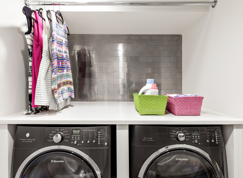 This is an example of a contemporary laundry room in New York.