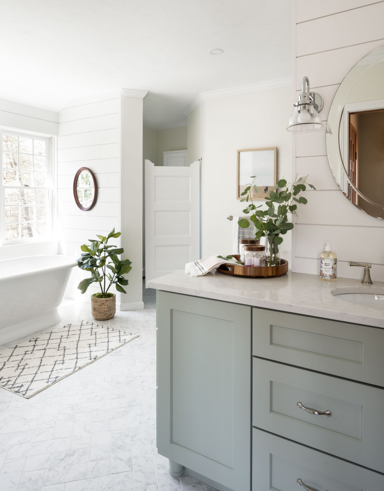 Large country master gray tile and porcelain tile porcelain tile, gray floor and double-sink bathroom photo in Boston with shaker cabinets, green cabinets, a two-piece toilet, white walls, a drop-in sink, quartz countertops, white countertops and a built-in vanity