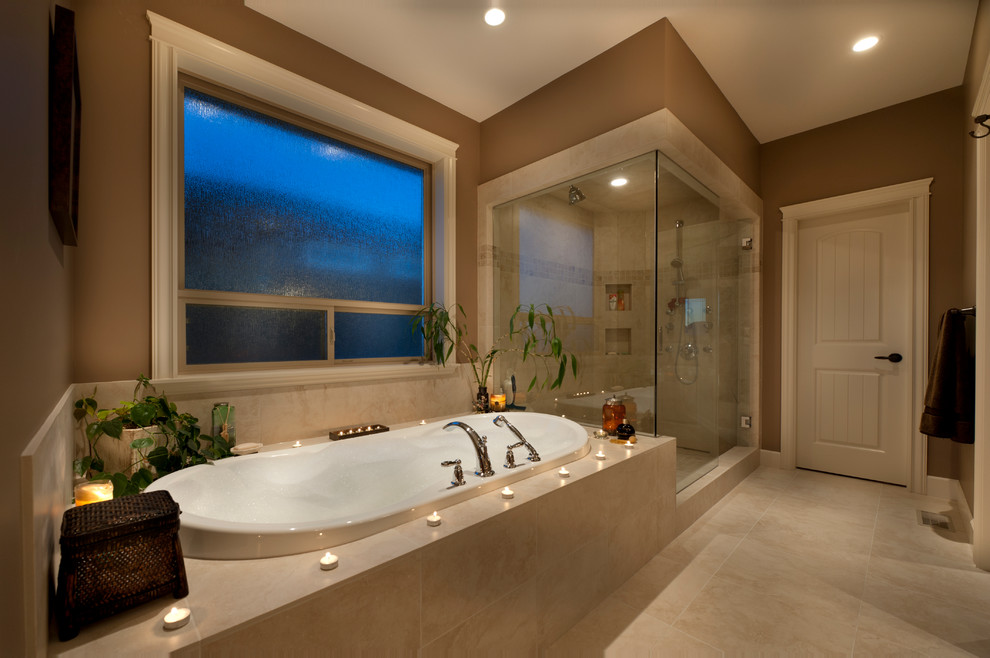 Traditional bathroom in Vancouver with a vessel sink, raised-panel cabinets, white cabinets, marble benchtops, a drop-in tub, an open shower, white tile and stone tile.