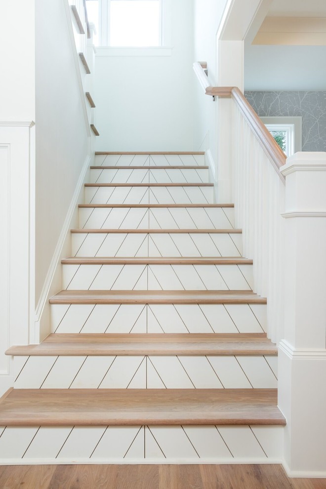 Photo of a farmhouse staircase in Charlotte.