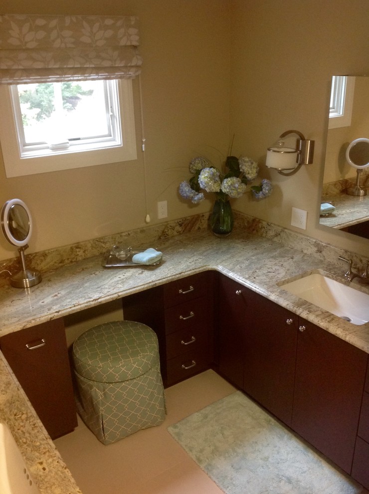 Example of a large transitional master beige tile and porcelain tile porcelain tile home design design in Boston with an undermount sink, flat-panel cabinets, dark wood cabinets, granite countertops, a wall-mount toilet and beige walls