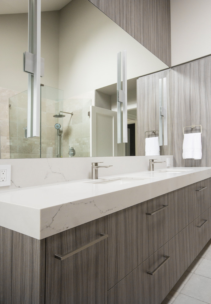 Contemporary master bathroom in Toronto with flat-panel cabinets, grey cabinets, an undermount sink, engineered quartz benchtops, a hinged shower door and white benchtops.