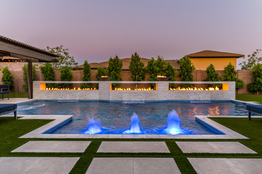 Inspiration for a large modern backyard rectangular pool in Phoenix.