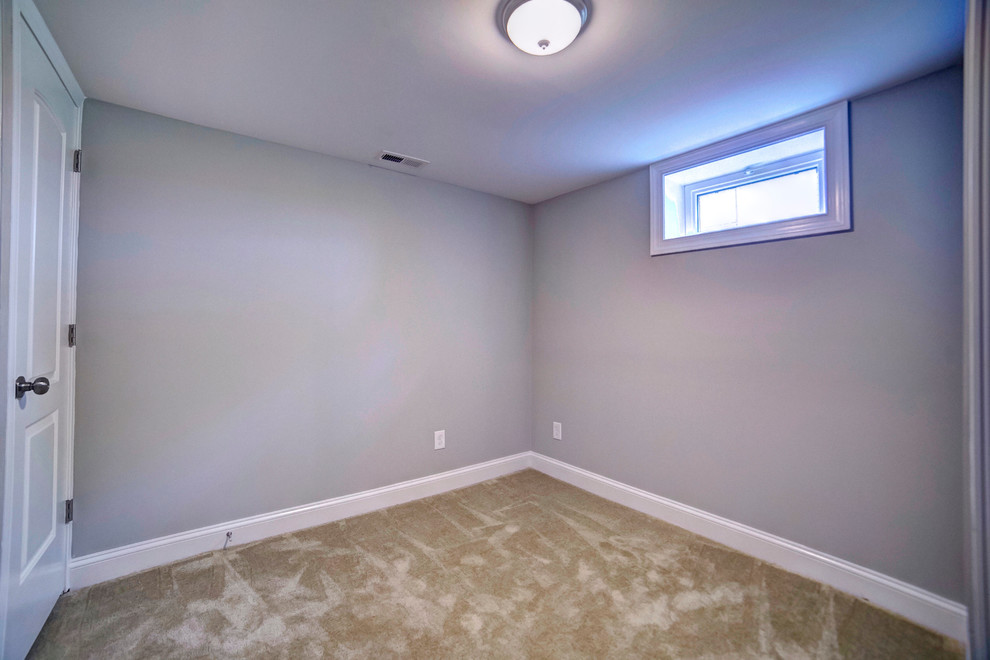 Example of a transitional home design design in Baltimore