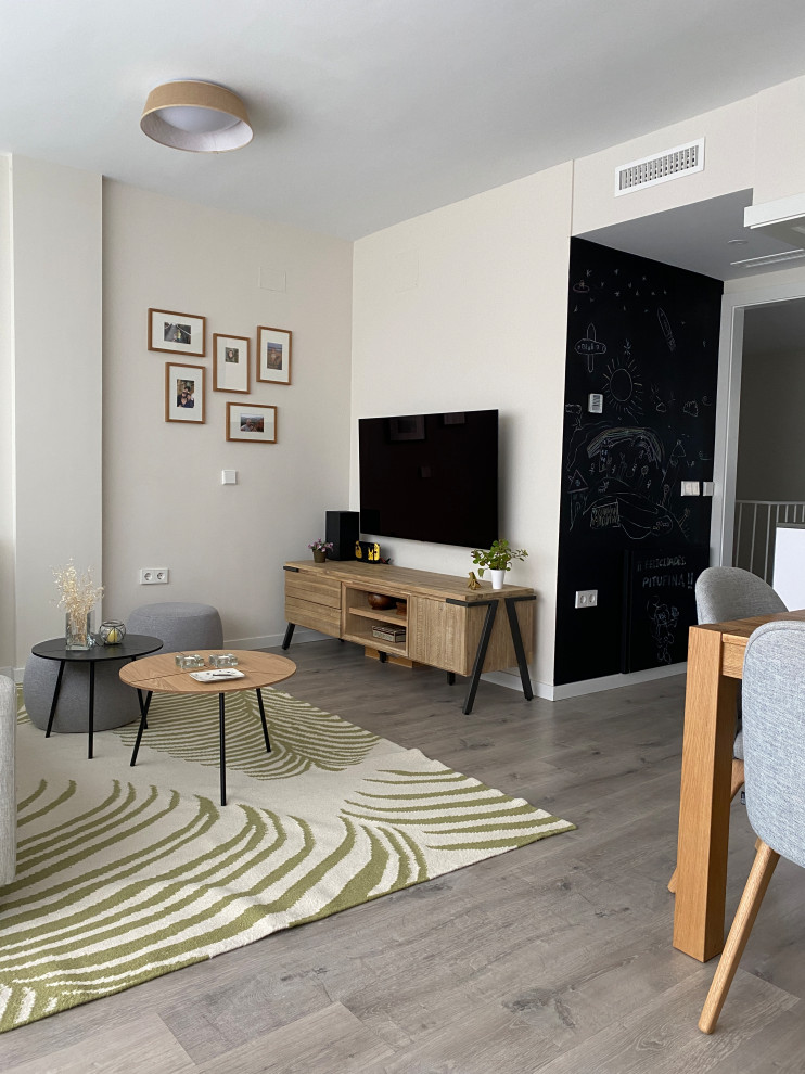 Design ideas for a medium sized scandinavian open plan living room in Madrid with wallpapered walls.