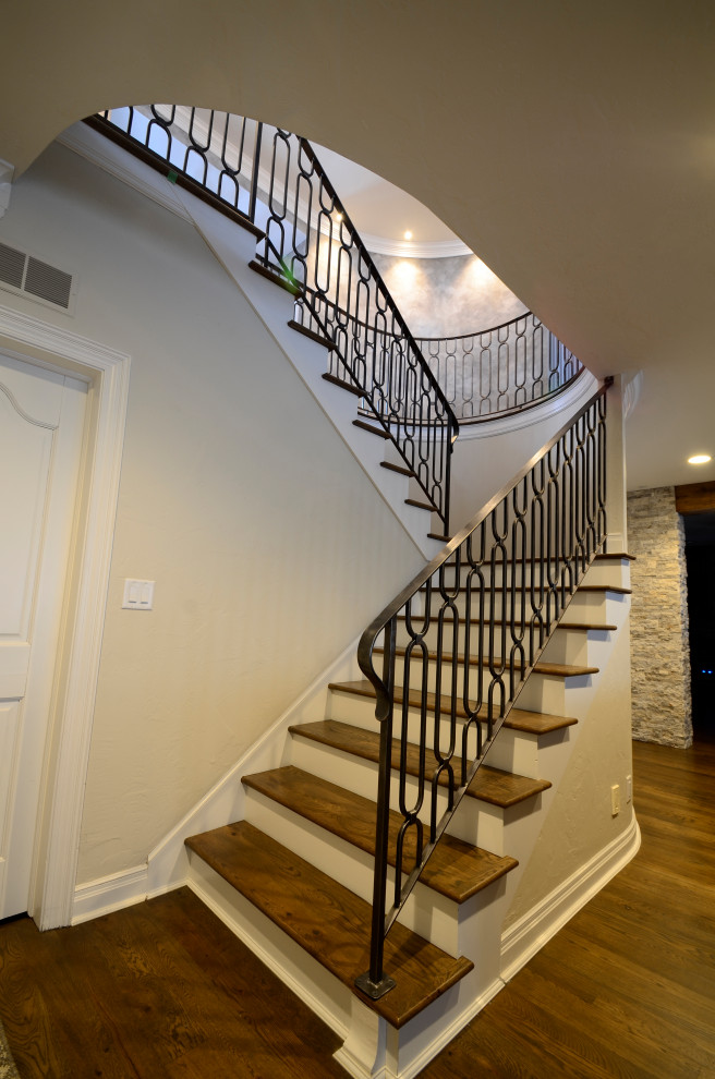 Design ideas for an expansive transitional staircase in Milwaukee with brick walls.