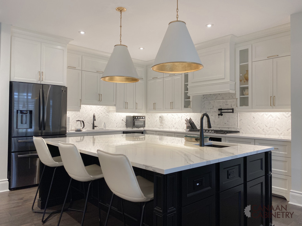 Example of a transitional kitchen design in Toronto