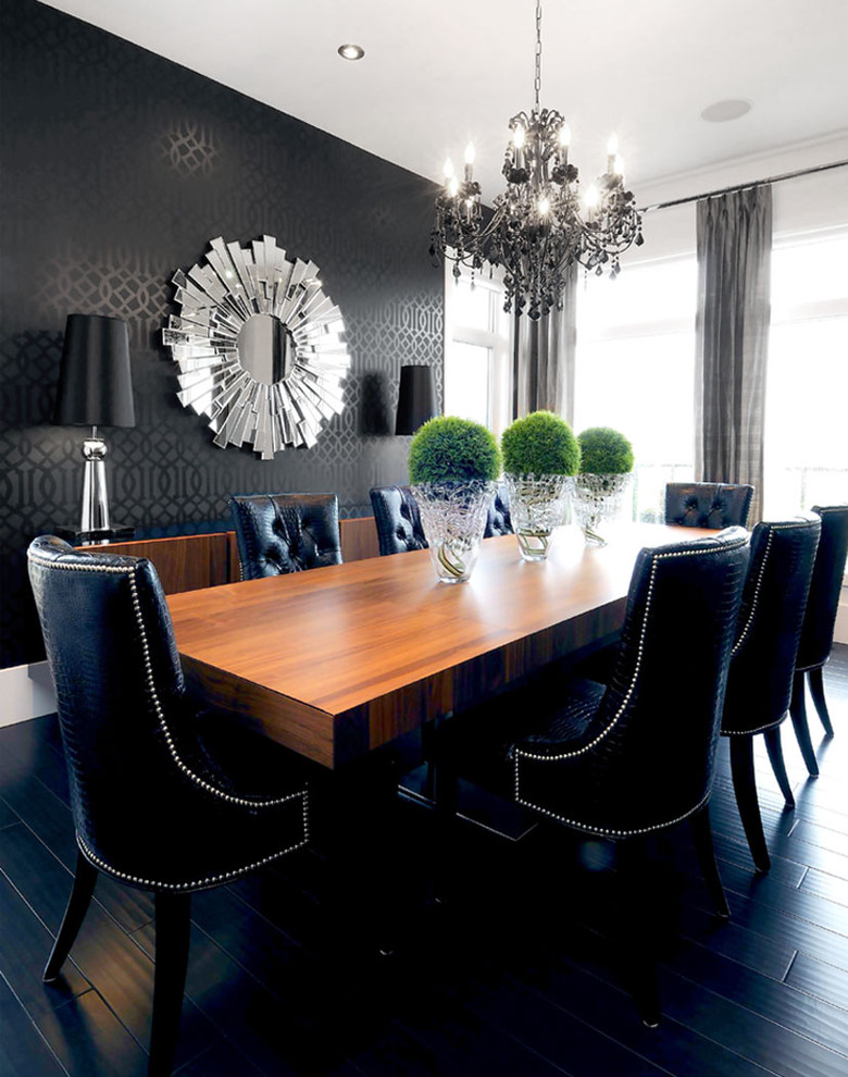 This is an example of a contemporary dining room in Other with black walls and black floor.
