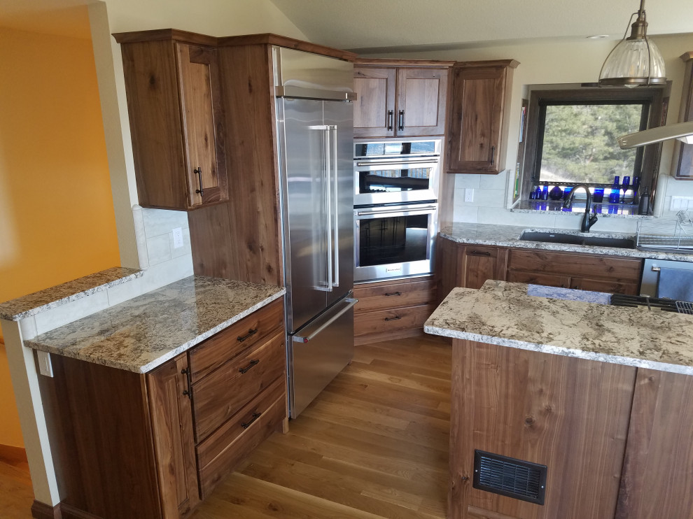 Mountain style kitchen photo in Denver