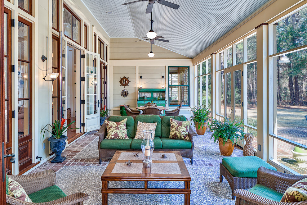 Photo of a traditional sunroom in Atlanta with brick floors and a standard ceiling.