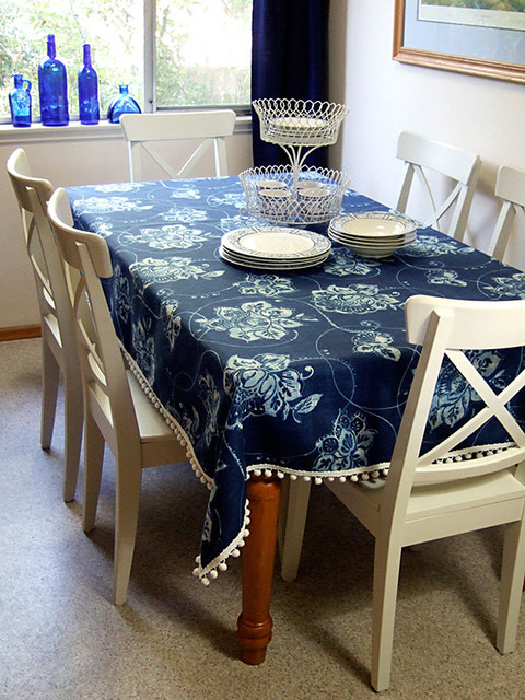 Tablecloth with pom-pom trim