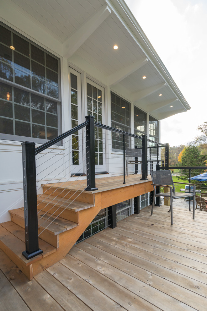 Design ideas for a transitional backyard verandah in Philadelphia.