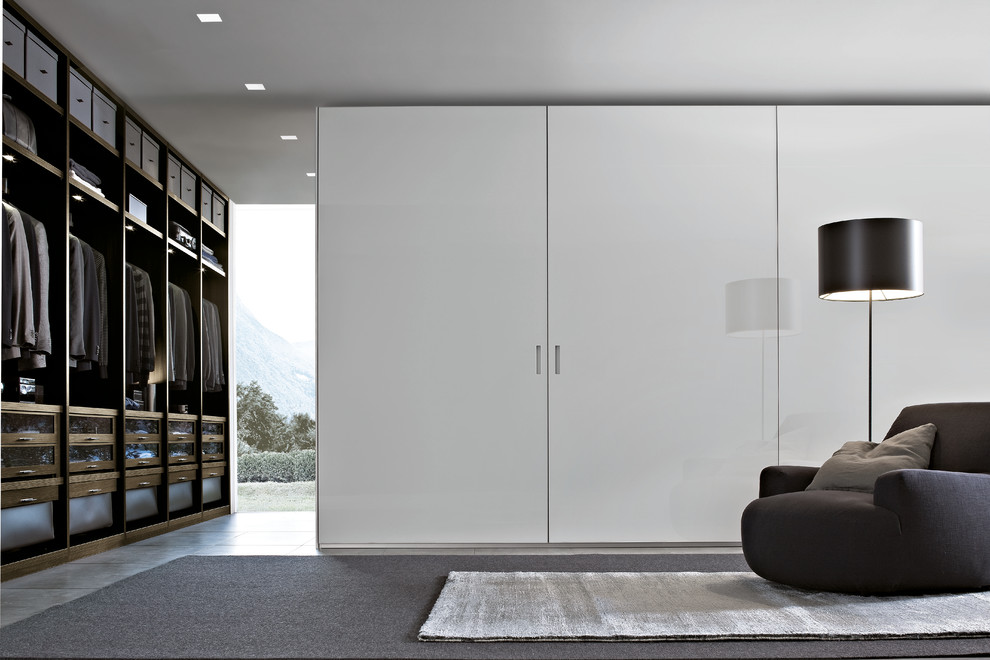 Contemporary storage and wardrobe in Sydney with white cabinets.