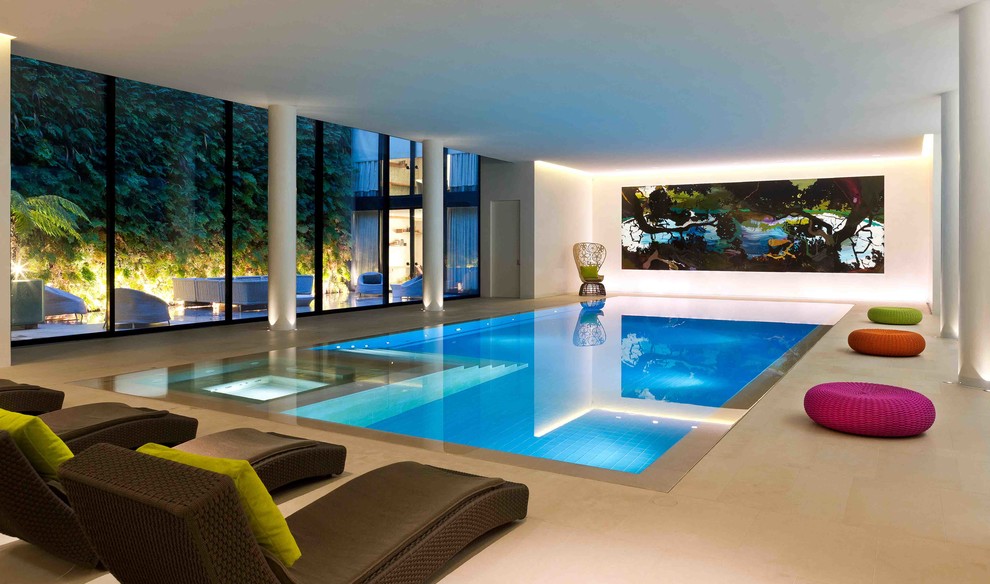 Inspiration for a large contemporary indoor rectangular pool in London.