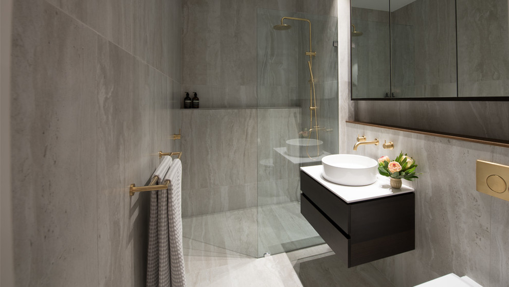 Small contemporary master bathroom in Adelaide with gray tile, porcelain tile, grey walls, porcelain floors, grey floor, furniture-like cabinets, dark wood cabinets, an open shower, quartzite benchtops and white benchtops.