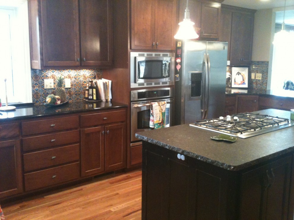 How can I brighten up my dark kitchen?My kitchen has black granite