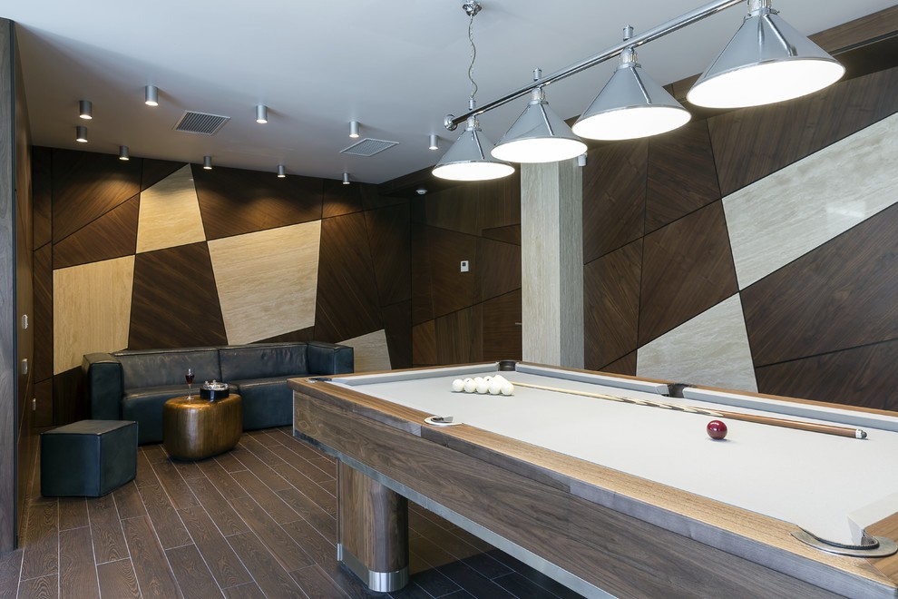 Photo of a contemporary family room in Moscow with a game room, brown floor and multi-coloured walls.