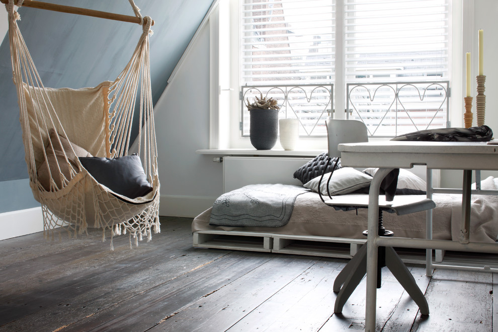 Mid-sized country loft-style bedroom in Bridgeport with multi-coloured walls, dark hardwood floors, brown floor and no fireplace.