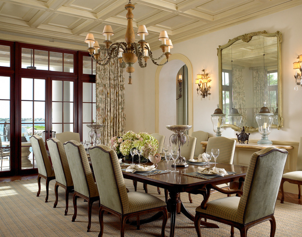 Traditional dining room in New York with white walls and dark hardwood floors.