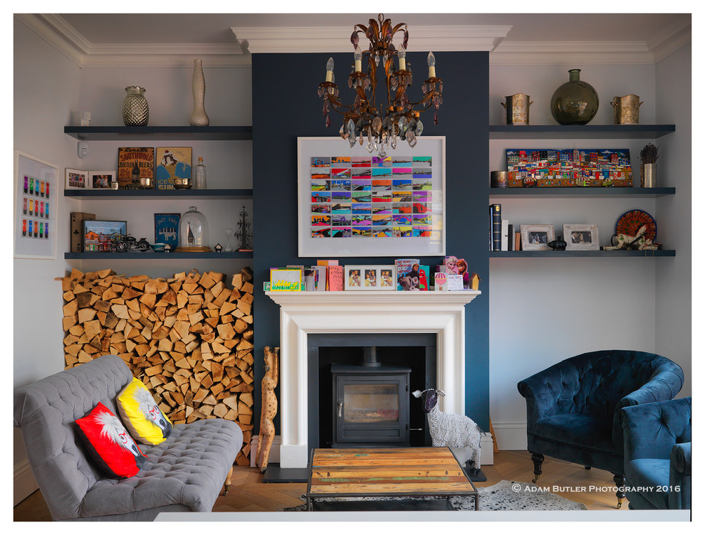 Inspiration for an eclectic living room in London with light hardwood floors.
