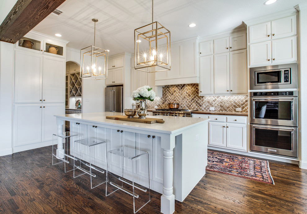 Inspiration for a transitional single-wall open plan kitchen in Dallas with shaker cabinets, white cabinets, dark hardwood floors and with island.