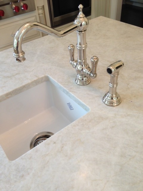 Kitchen - kitchen idea in Chicago with granite countertops and stone slab backsplash
