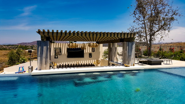 Outdoor Entertainment and Massive Pool modern-pools