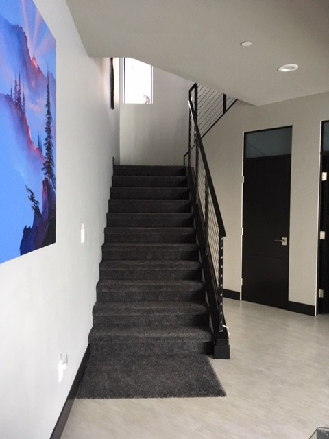 This is an example of a large contemporary staircase in Las Vegas.