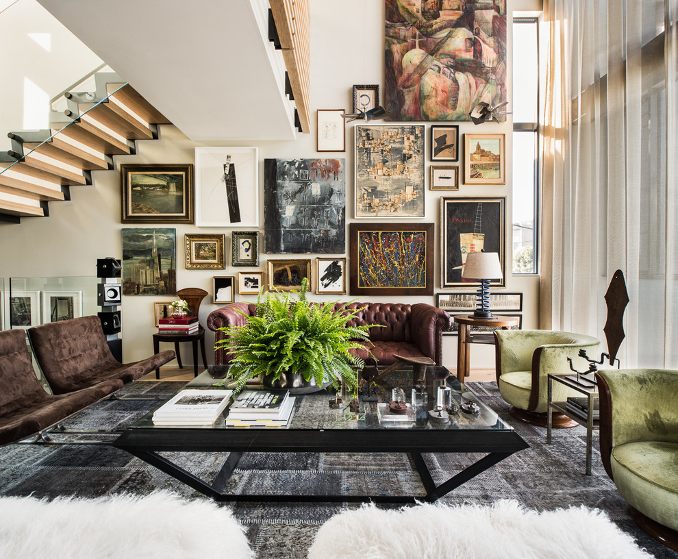Inspiration for a mid-sized eclectic formal open concept living room in San Francisco with no tv, white walls, light hardwood floors and no fireplace.