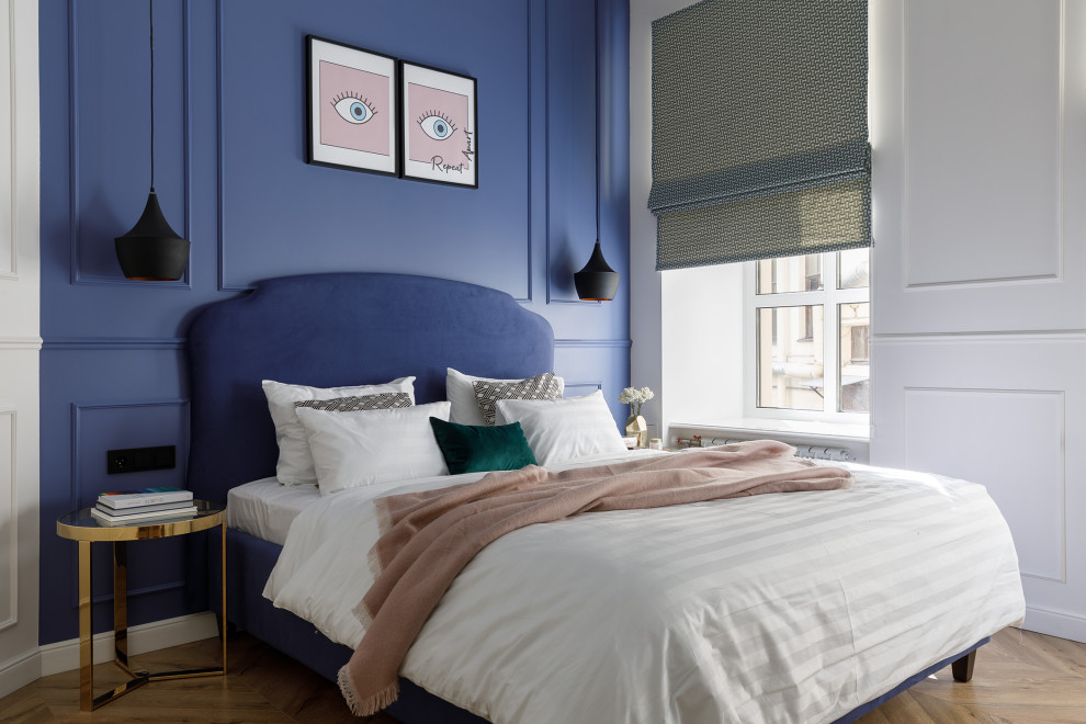 Inspiration for a transitional bedroom in Saint Petersburg with blue walls, medium hardwood floors and brown floor.