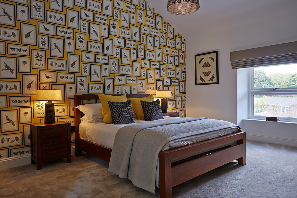 Inspiration for an expansive country master and grey and white bedroom with green walls, carpet, a standard fireplace, a stone fireplace surround, grey floors and a feature wall.