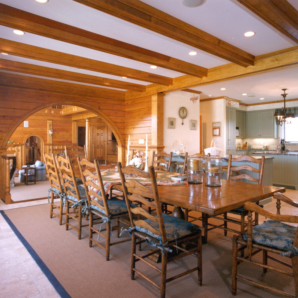 This is an example of a beach style dining room in New York.