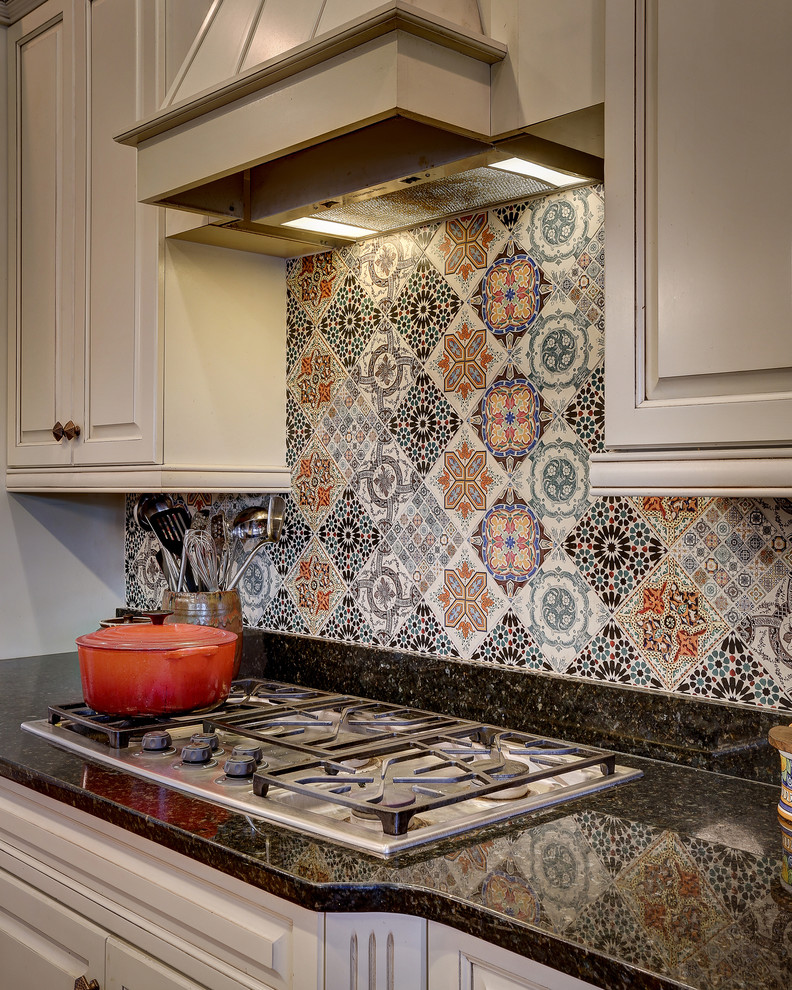 Photo of an eclectic kitchen in Other with blue splashback and porcelain splashback.
