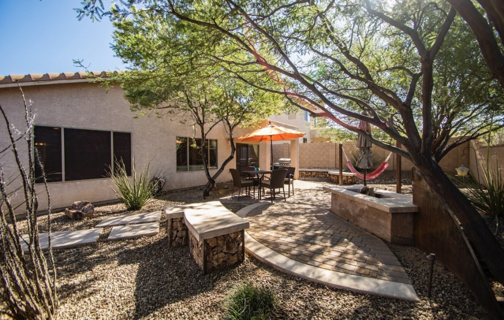 Example of a small mountain style home design design in Phoenix