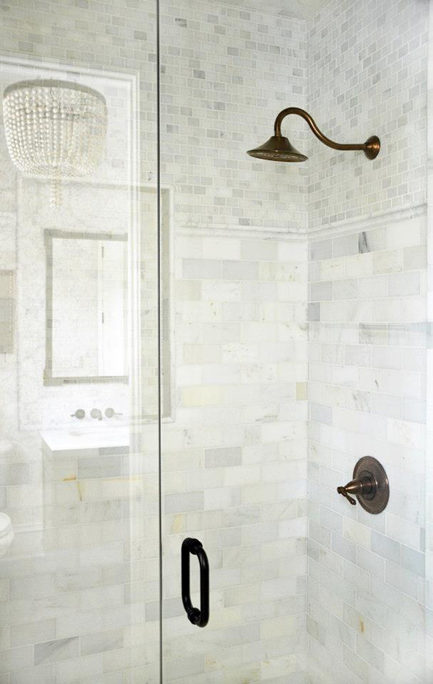 Large elegant gray tile and stone tile marble floor bathroom photo in Milwaukee with gray walls