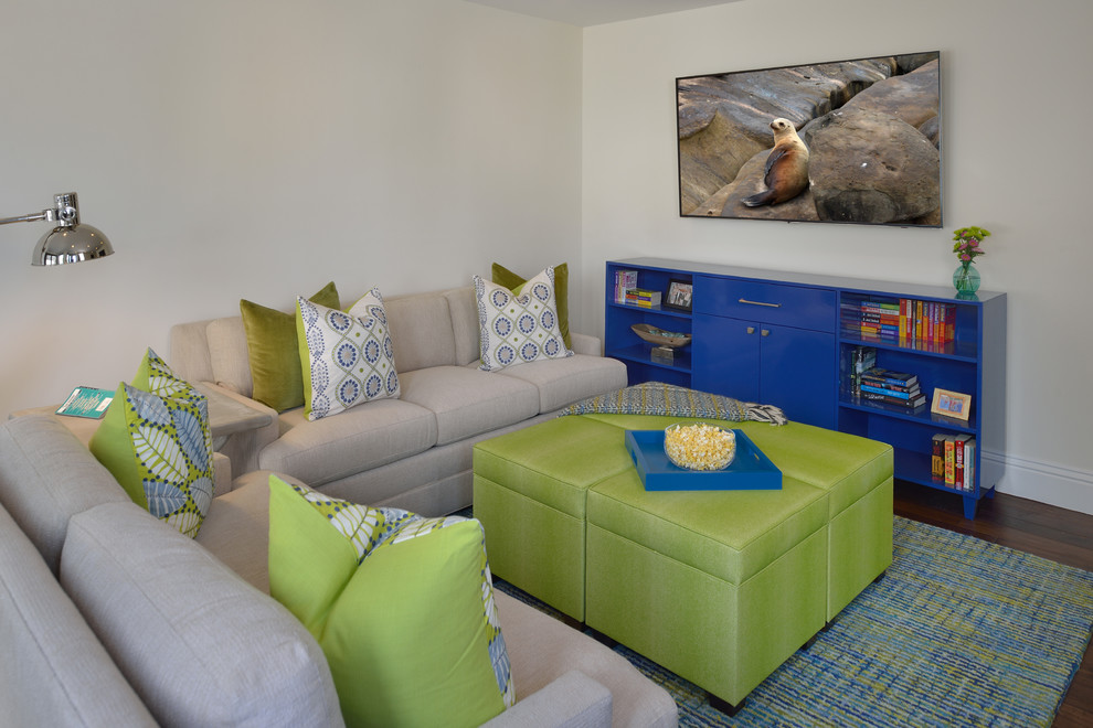Inspiration for a small transitional open concept family room in San Diego with a game room, grey walls, medium hardwood floors, no fireplace and a wall-mounted tv.