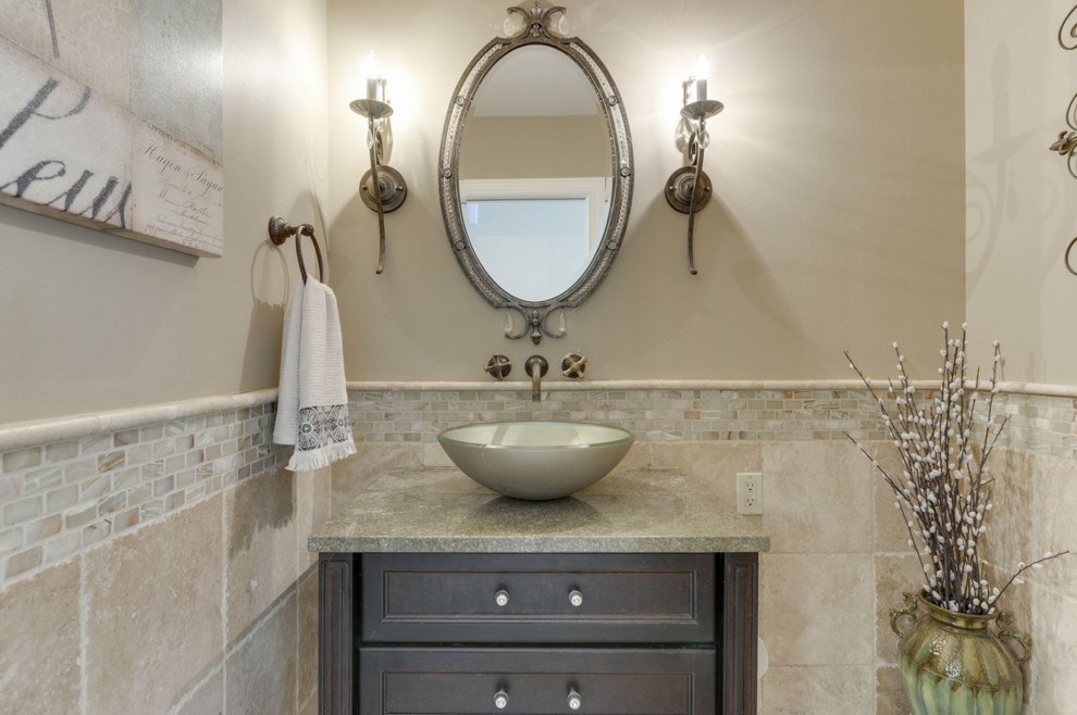 Design ideas for a small traditional powder room in Minneapolis with recessed-panel cabinets, brown cabinets, a one-piece toilet, beige walls, dark hardwood floors, a vessel sink, engineered quartz benchtops, brown floor and beige benchtops.
