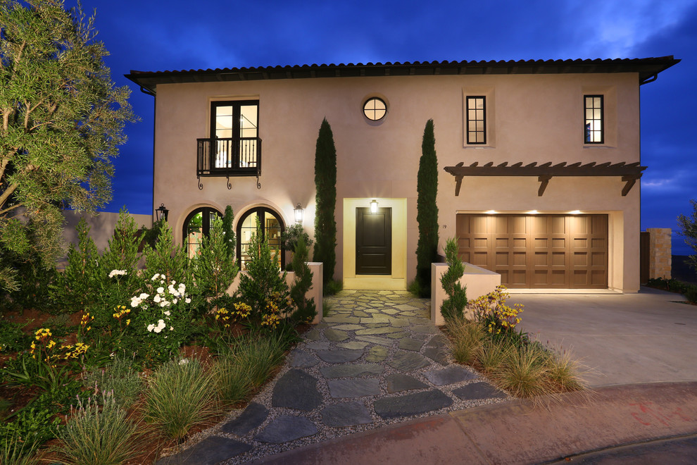 This is an example of a two-storey beige exterior in Orange County.