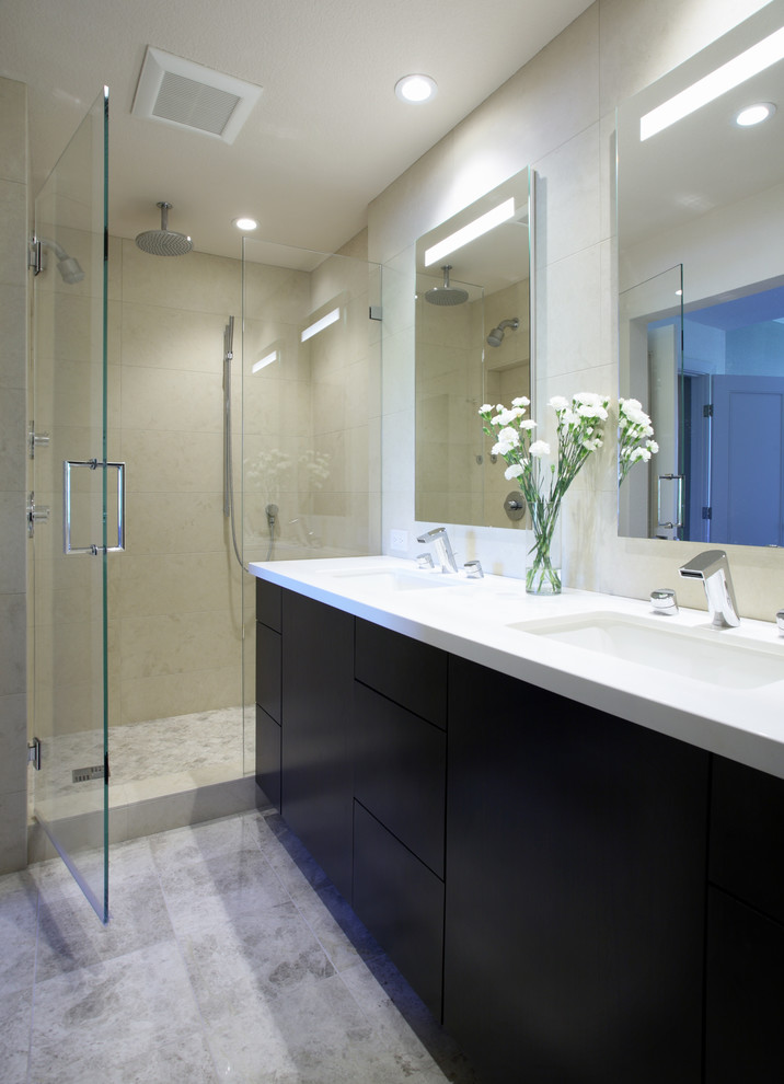 Mid-sized contemporary master bathroom in San Francisco with flat-panel cabinets, brown cabinets, an alcove shower, beige tile, porcelain tile, travertine floors, an undermount sink, engineered quartz benchtops, grey floor and a hinged shower door.