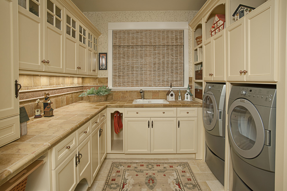 Design ideas for a traditional laundry room in Seattle with tile benchtops.