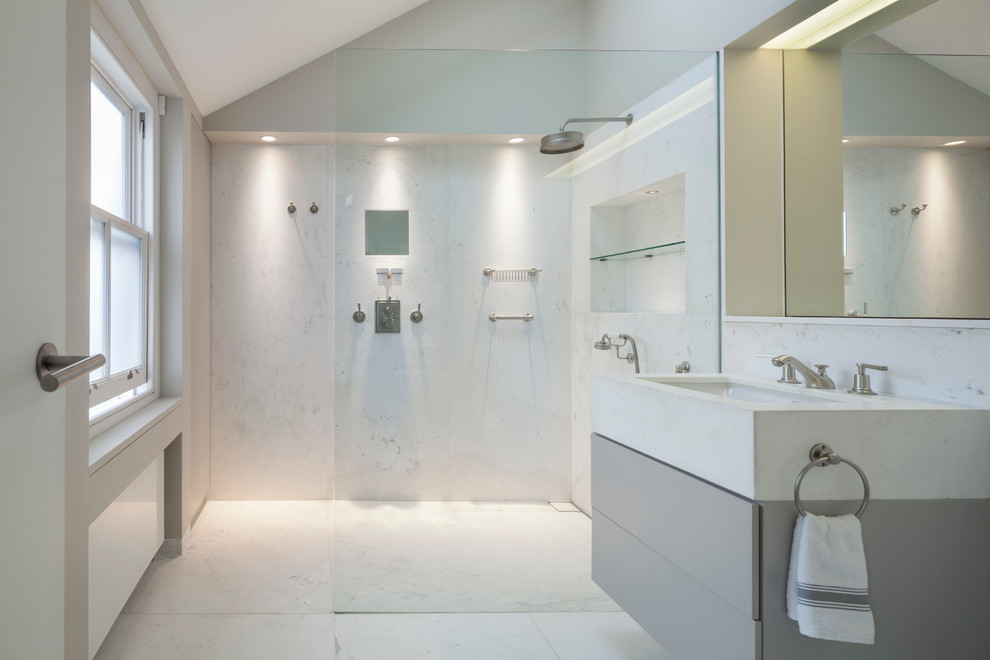 Design ideas for a contemporary master bathroom in London with an undermount sink, flat-panel cabinets, grey cabinets, marble benchtops, marble floors, white walls and a curbless shower.