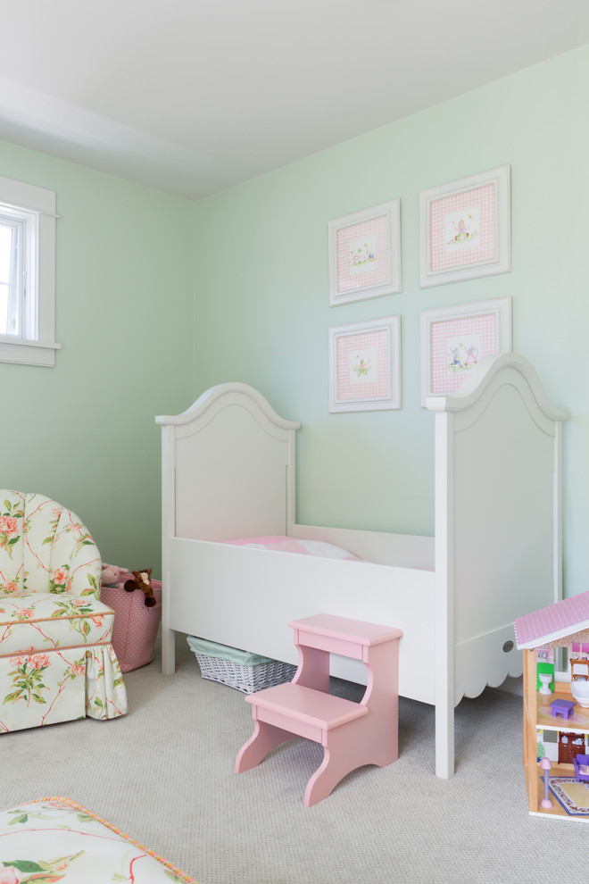 Design ideas for a mid-sized contemporary nursery for girls in Boston with green walls, carpet and grey floor.