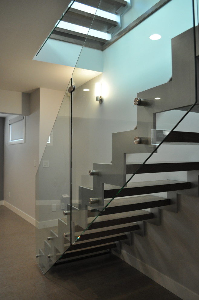 Design ideas for a mid-sized modern wood straight staircase in Edmonton with open risers.
